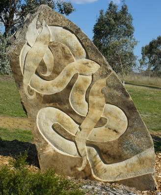 Pioneer Woman sandstone sculpture